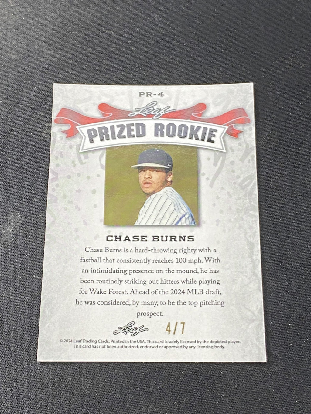 Chase Burns 2024 Leaf Prized Metal Rookie Black /7 RC