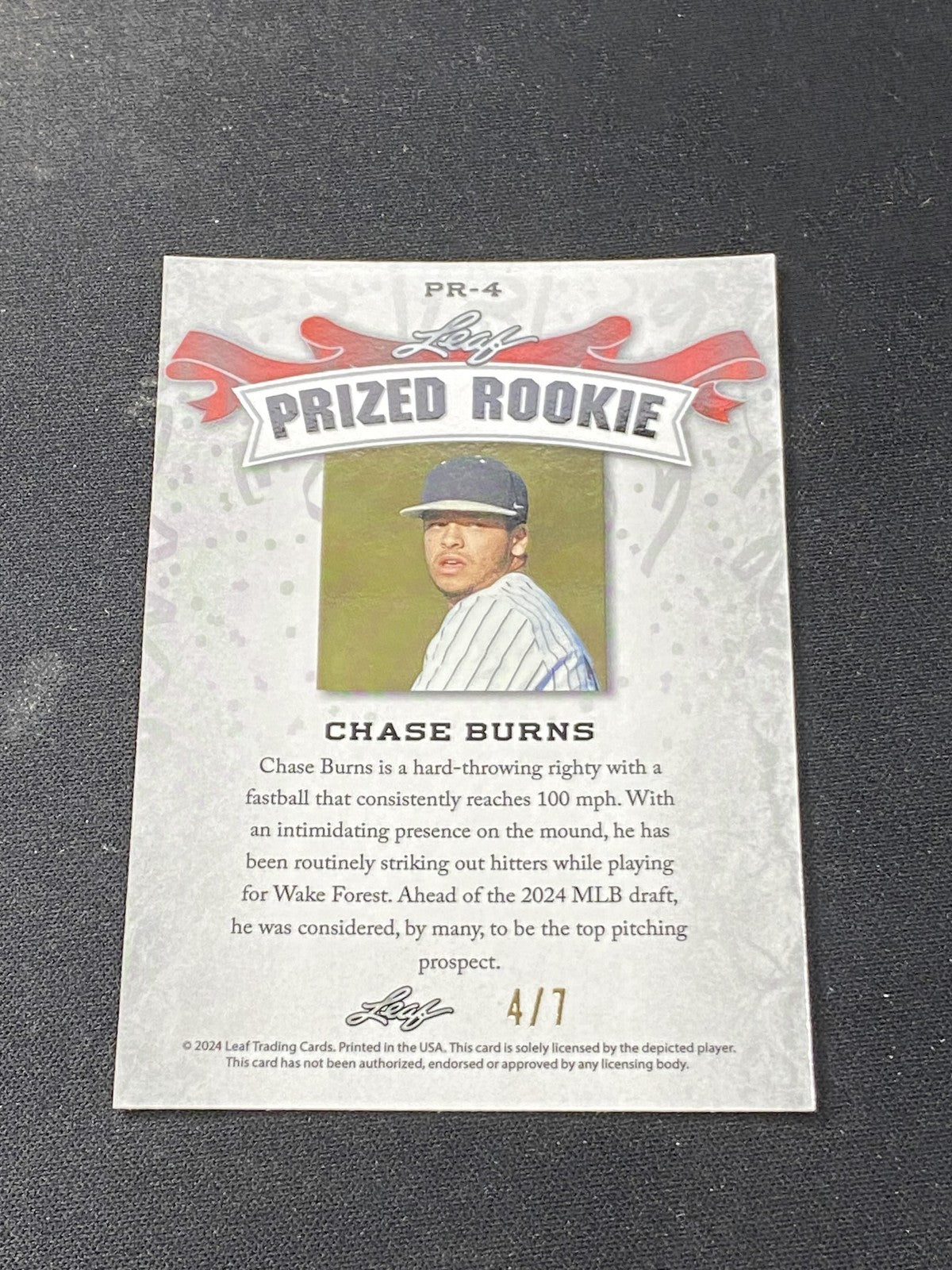 Chase Burns 2024 Leaf Prized Metal Rookie Black /7 RC