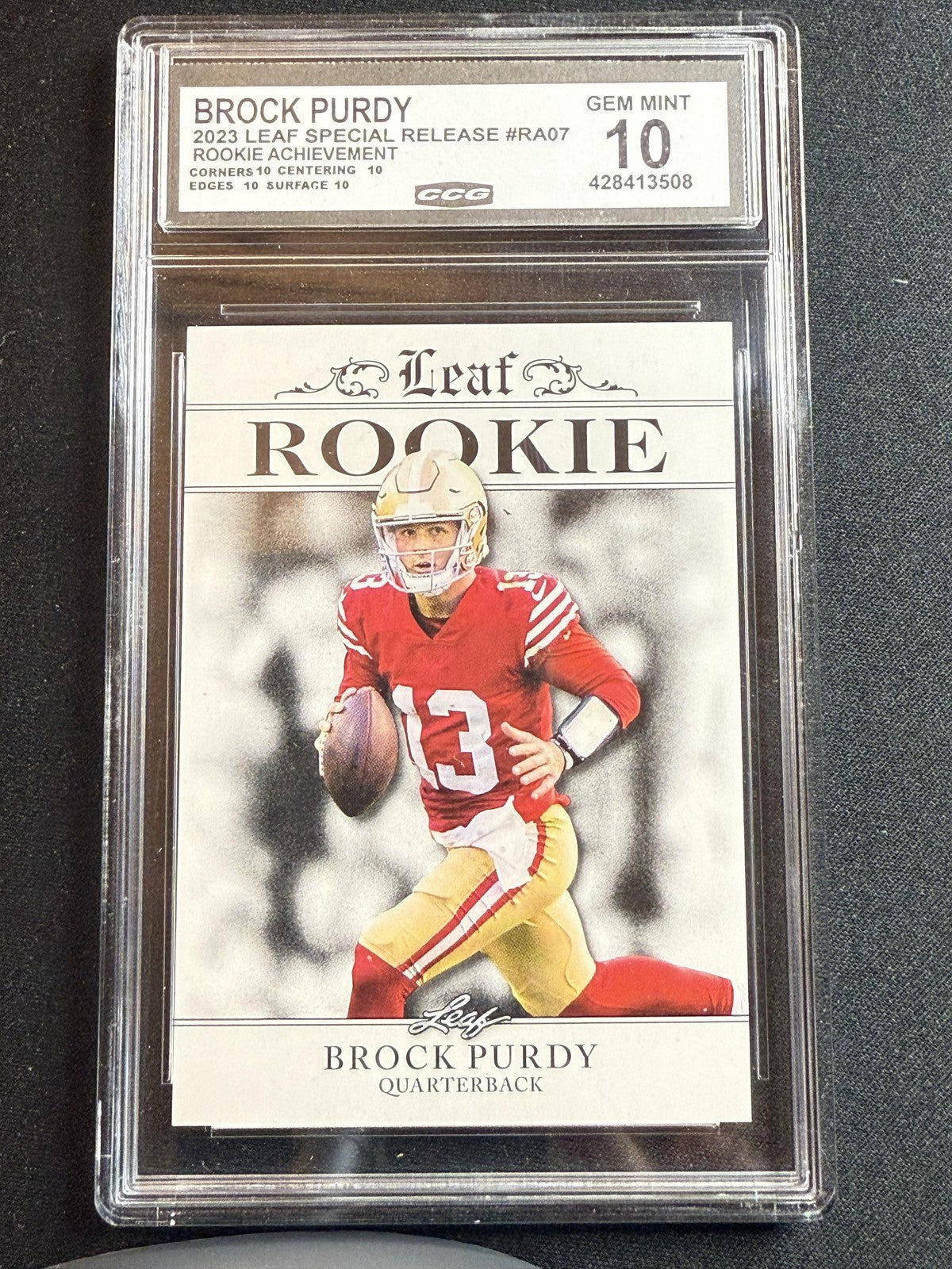Brock Purdy 2023 Leaf Rookie Achievement CCG 10 RC