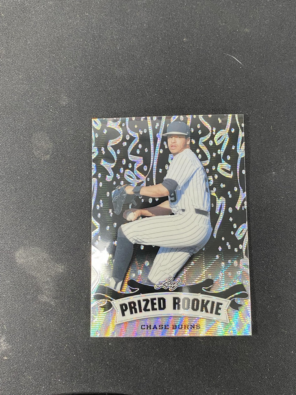 Chase Burns 2024 Leaf Prized Metal Rookie Black /7 RC