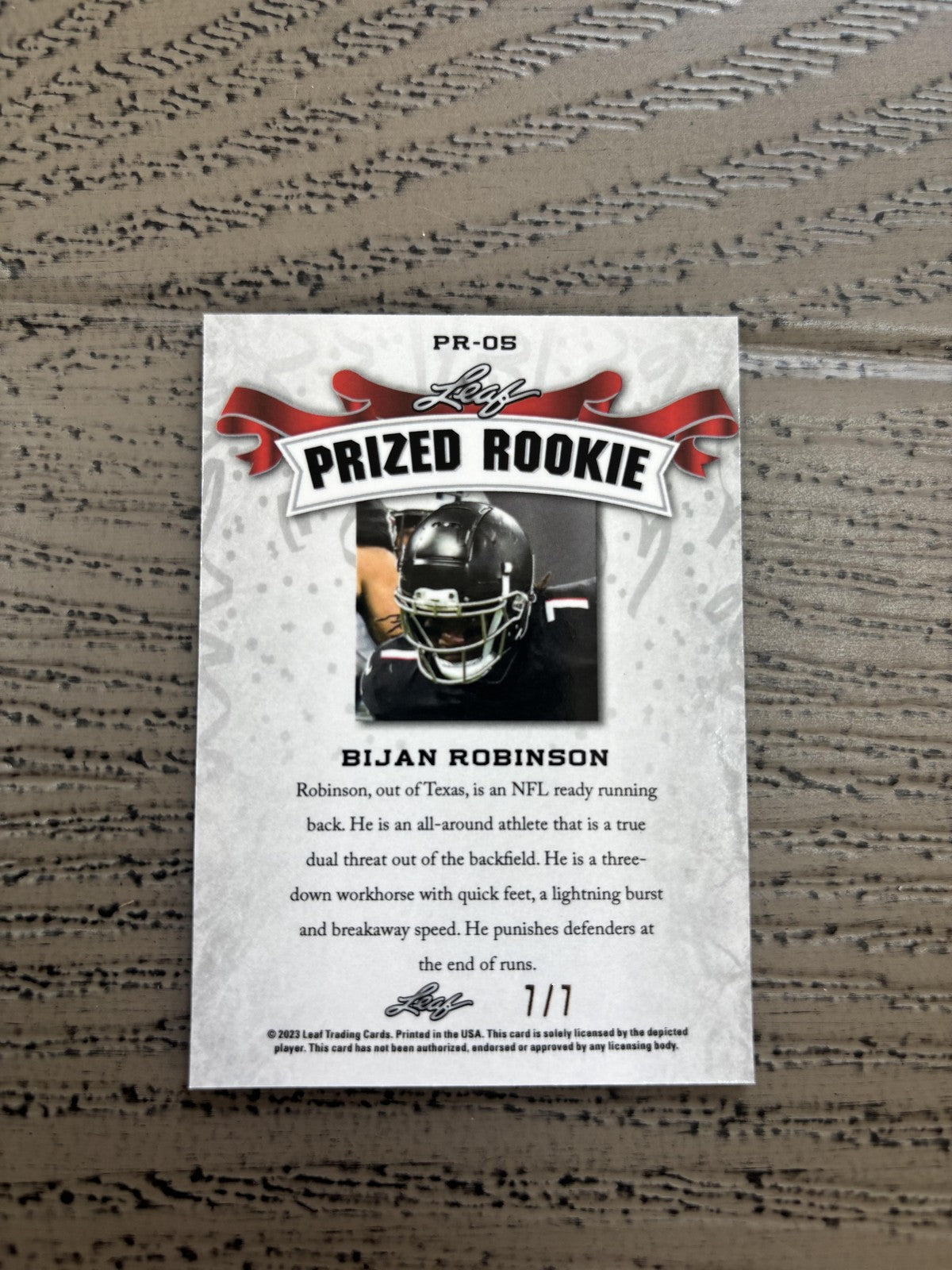 Bijan Robinson 2023 Leaf Prized Metal Rookie Black /7 RC Falcons
